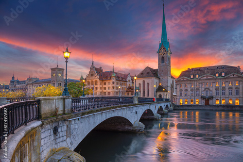 Cityscape image of Zurich, Switzerland during dramatic sunset.