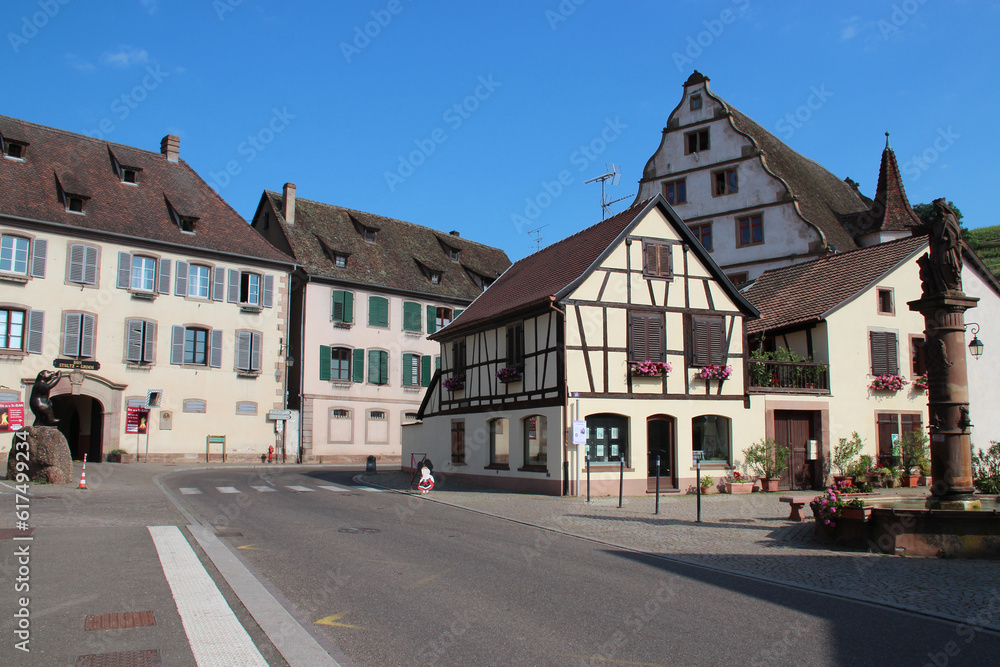 street and medieval houses in andlau in alsace (france)