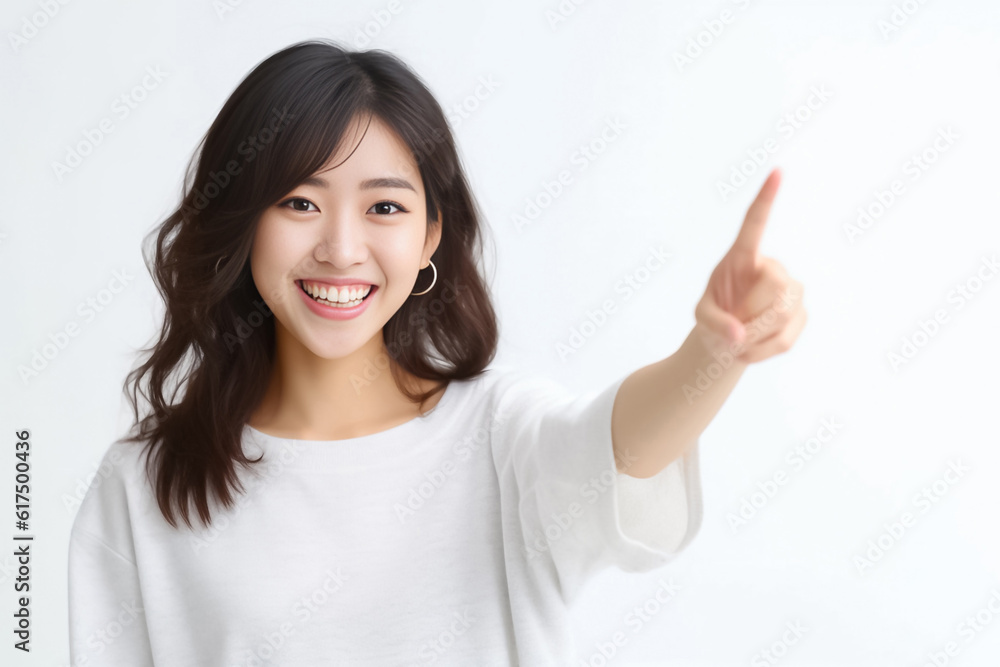 Pointing finger of an Asian girl highlights vacant space on a white background, making it a prime choice for a promotional advertising banner. Generative AI. Pointing finger of an Asian girl highlights vacant space on a white background, making it a prime choice for a promotional advertising banner. Generative AI.