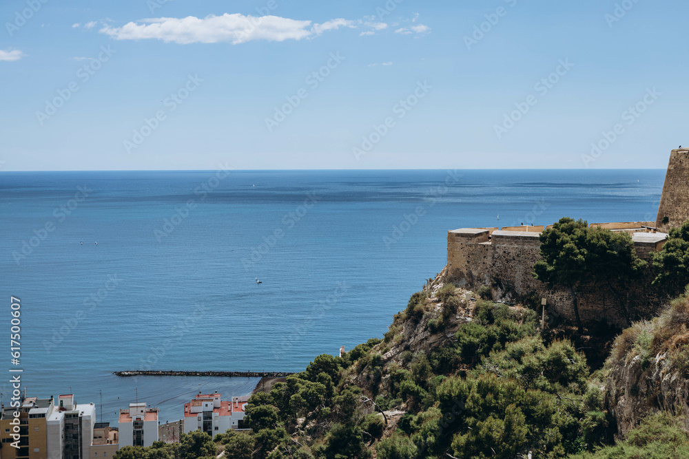 Sea view of Harbour in the Mediterranean Sea from Santa Barbara Castle, Alicante. Summer vacation in Spain. Enjoy breathtaking panoramic views over the blue waters