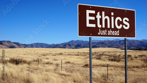 Ethics road sign with blue sky and wilderness