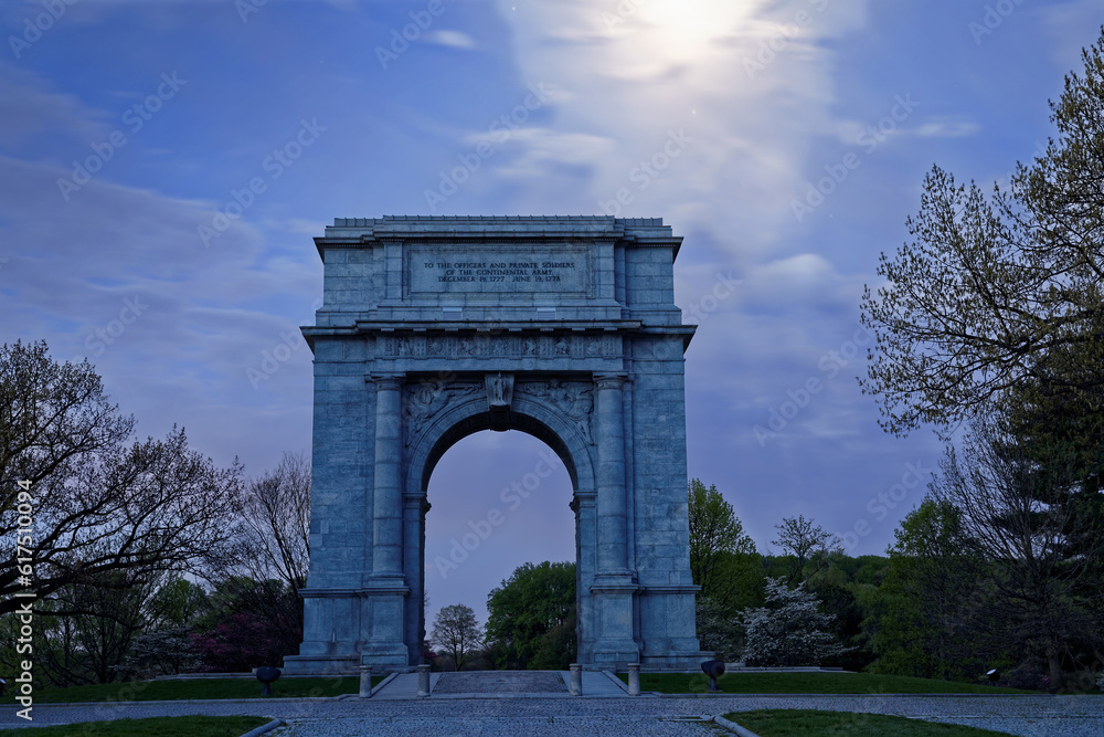 Springtime predawn moonlight at Valley Forge National Historical Park in Pennsylvania, USA.The National Memorial Arch is a monument dedicated to George Washington and the United States Continental Arm