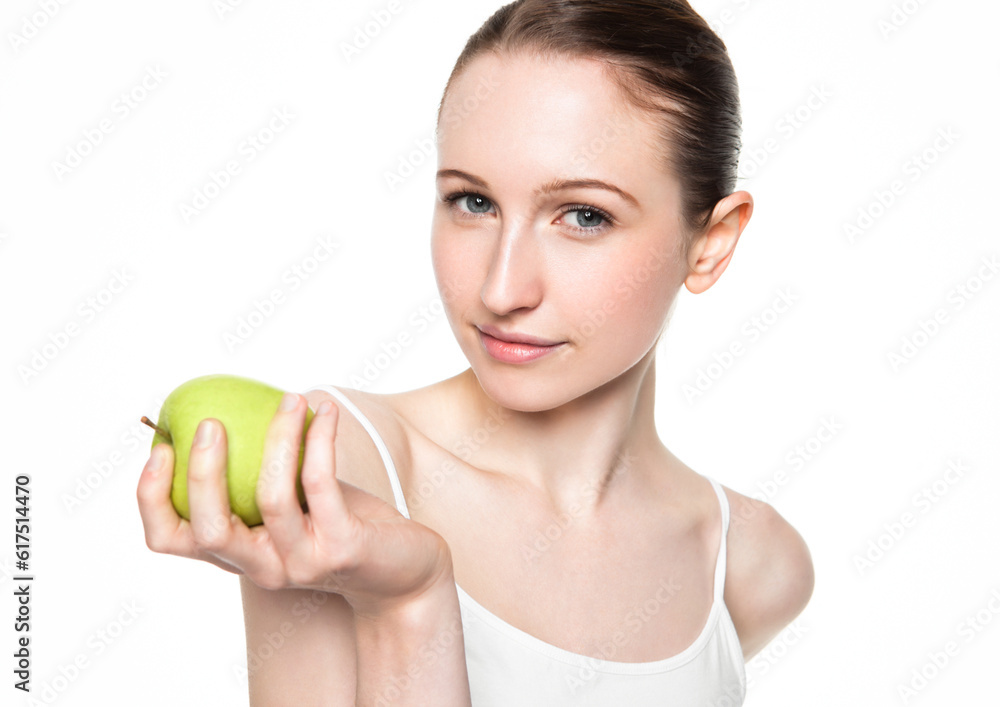 Beautiful fitness woman holding healthy apple on white background Beautiful fitness woman holding healthy apple on white background