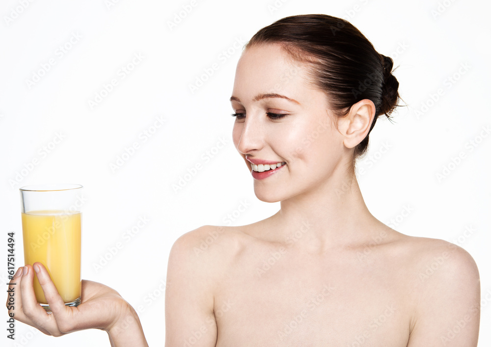 Beautiful woman holding glass with orange juice with white top on white background Beautiful woman holding glass with orange juice with white top on white background