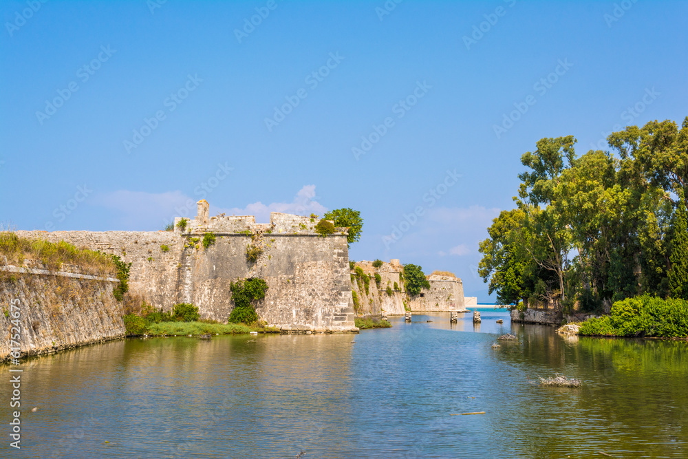 Moat and walls of the Venetian Castle of Agia Mavra at the Greek island of Lefkada. The original building of the castle of Agia Mavra was constructed in 1300.