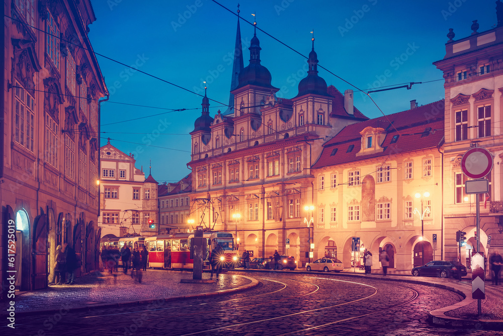 Fototapeta premium Czech Republic Prague square with old tram public transport dark evening street blue sky