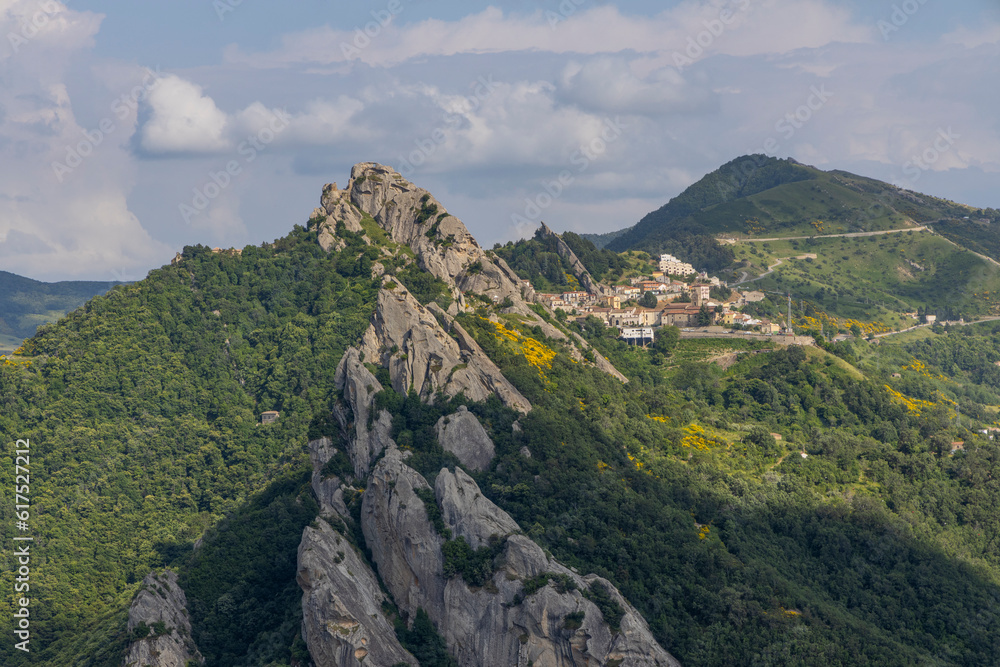View of Pietrapertosa and Castelmezzano. Two beautiful villages built on the Lucanian Dolomites in Italy. Connected by a zipline that crosses the valley adrenaline-pumping experience. Day and sunset.