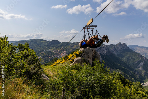 Flight of the angel, Pietrapertosa, Italy. Village nestled in the Lucanian Dolomites in Italy. Surrounded by rocks near Castelmezzano. The zipline flies between these peaks over a stunning panorama.