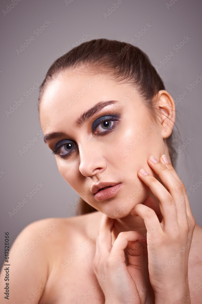 Portrait young woman with beautiful healthy face on gray background. Portrait young woman with beautiful healthy face on gray background.