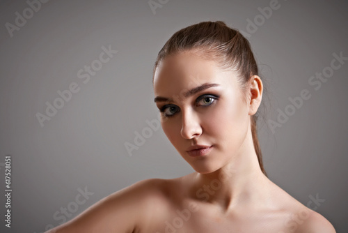 Portrait young woman with beautiful healthy face with dramatic light.