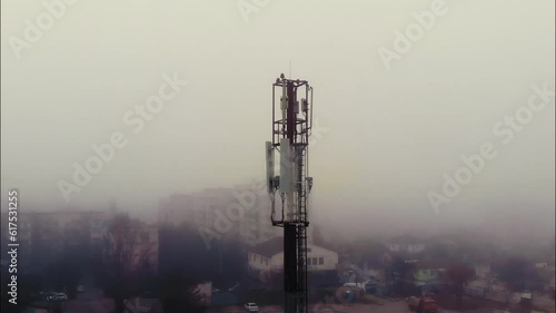 Telecommunications tower. Shooting from the air. Panorama.