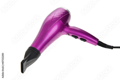Purple hair dryer with nozzle. isolated on white background. photo