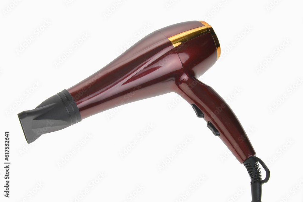 Red hair dryer with nozzle.
isolated on white background. Red hair dryer with nozzle.
isolated on white background.