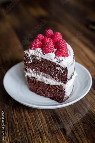 piece of chocolate cake with raspberries