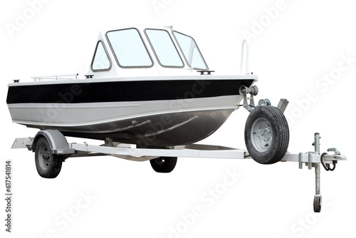 Motor boat on the trailer for transportation is isolated on a white background.