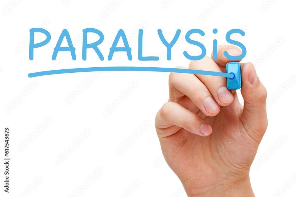 Hand writing Paralysis with blue marker on transparent glass board. Hand writing Paralysis with blue marker on transparent glass board.
