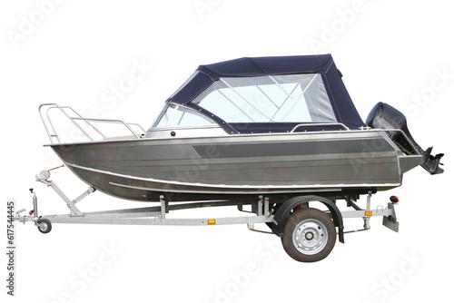 Motor boat with awning on the trailer for transportation