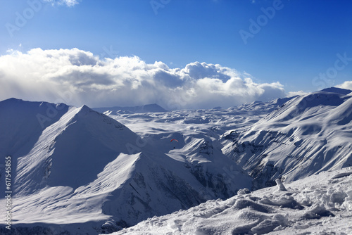 Speed flying in sunny winter mountains. Caucasus Mountains. Georgia, region Gudauri. © Designpics