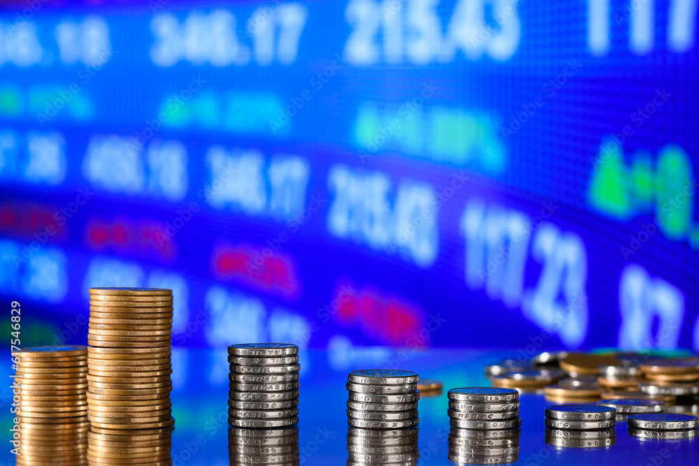 stack of coins forming a bar chart on a graph, investment concept, financial market stack of coins forming a bar chart on a graph, investment concept, financial market