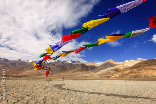 Photography Buddhist prayer flags near Pangong Tso - alpine lake in the Himalayas on the Chi