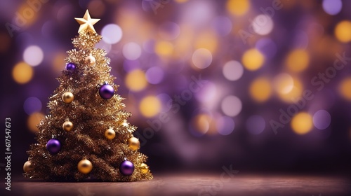 Christmas tree with blurry purple background with space for text