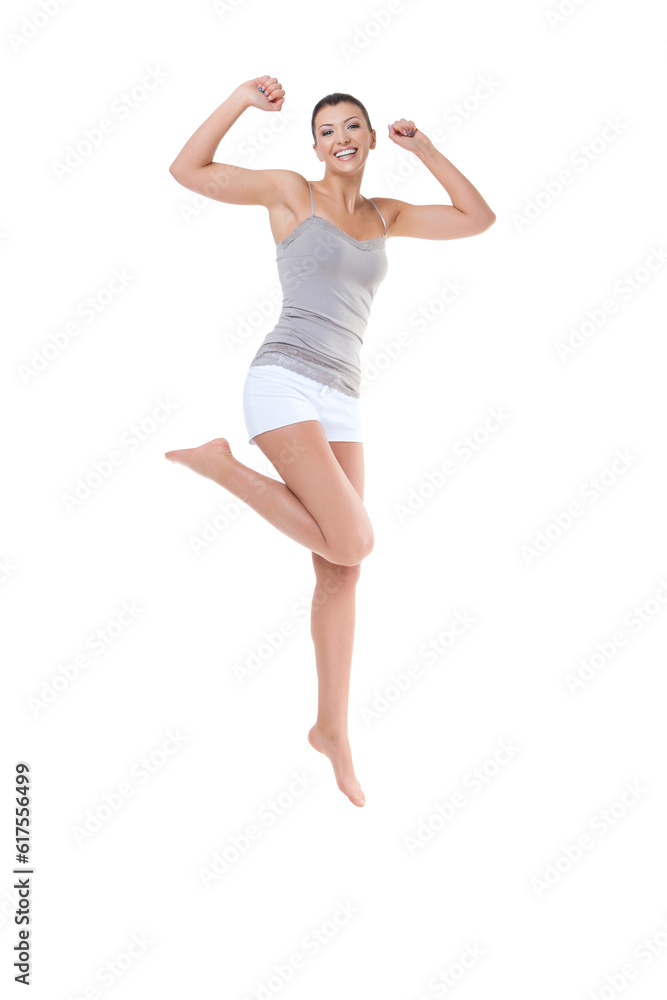 Beautiful happy young woman jumping. Isolated on white background. Copy space.