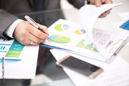 Businesssman recodnize business his business report in office photo