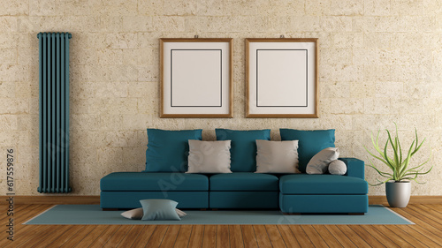 Modern living room with blue sofa and stone wall - 3d rendering