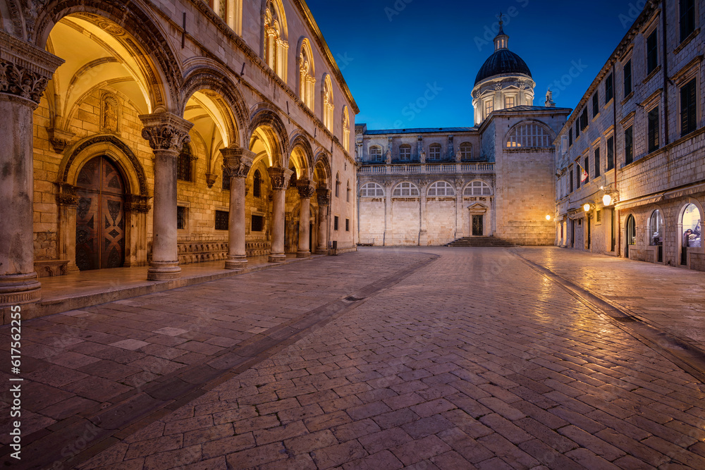 Beautiful romantic streets of old town Dubrovnik during twilight blue hour.