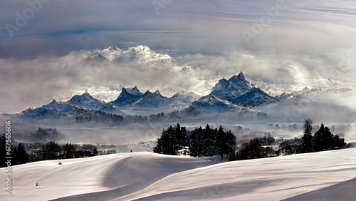 Winter panoramic view of the snowy high mountains of Swiss alps scenery 