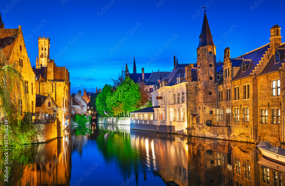 Bruges. Channel Rozenhoedkaai view to Perez de Malvenda house and Belfort tower. Belgium blue evening time. Bruges. Channel Rozenhoedkaai view to Perez de Malvenda house and Belfort tower. Belgium blue evening time.