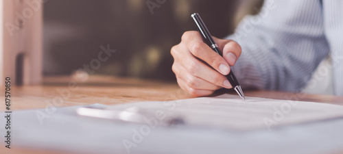 Business Agreements and Approvals ,business contract signing ,Confirmation of contract documents or warranty card ,legal contract ,guarantee correctness ,Signing a form ,Business paperwork