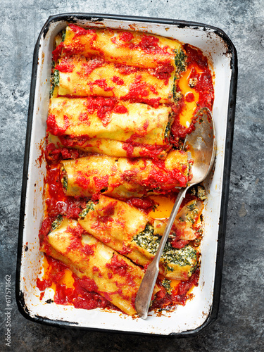 Canvas Print close up of rustic italian spinach ricotta cannelloni pasta