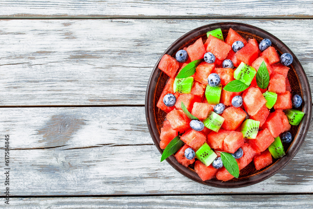 Watermelon and Blueberry salad on an earthenware dish top view