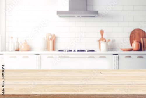 Empty Wood table top on blurred kitchen background..