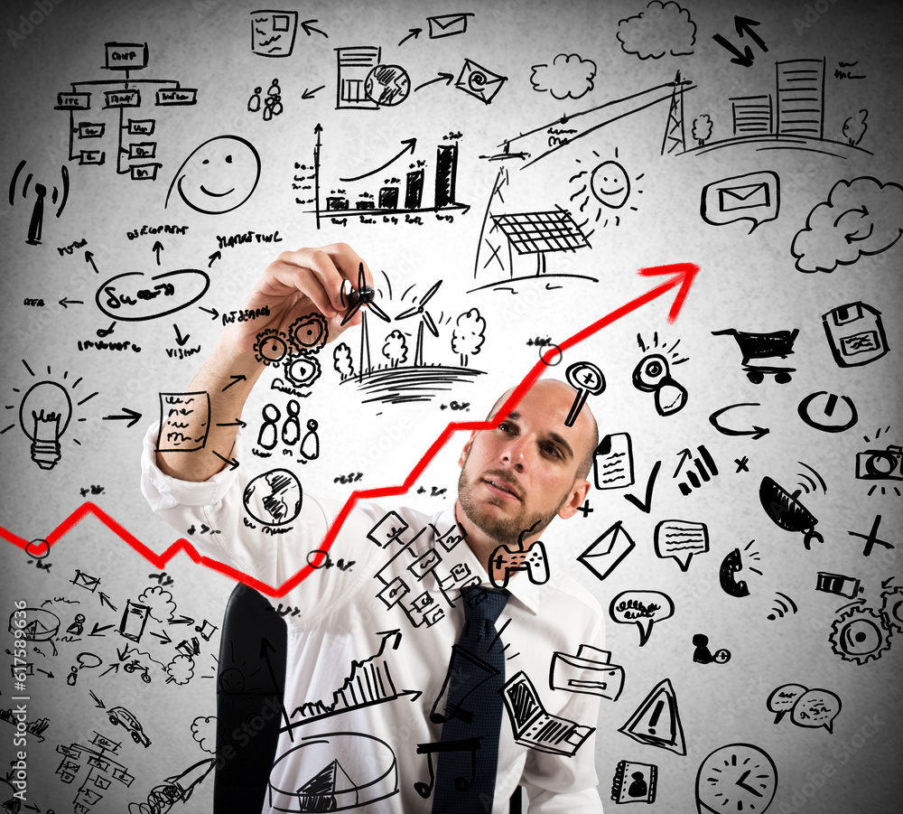 Businessman draws plan and project of business analysis Businessman draws plan and project of business analysis