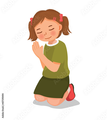 Cute little girl praying kneeling on her knee