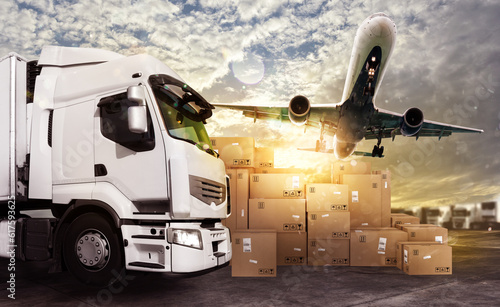 Truck and aircraft in a deposit with packages ready to start to deliver