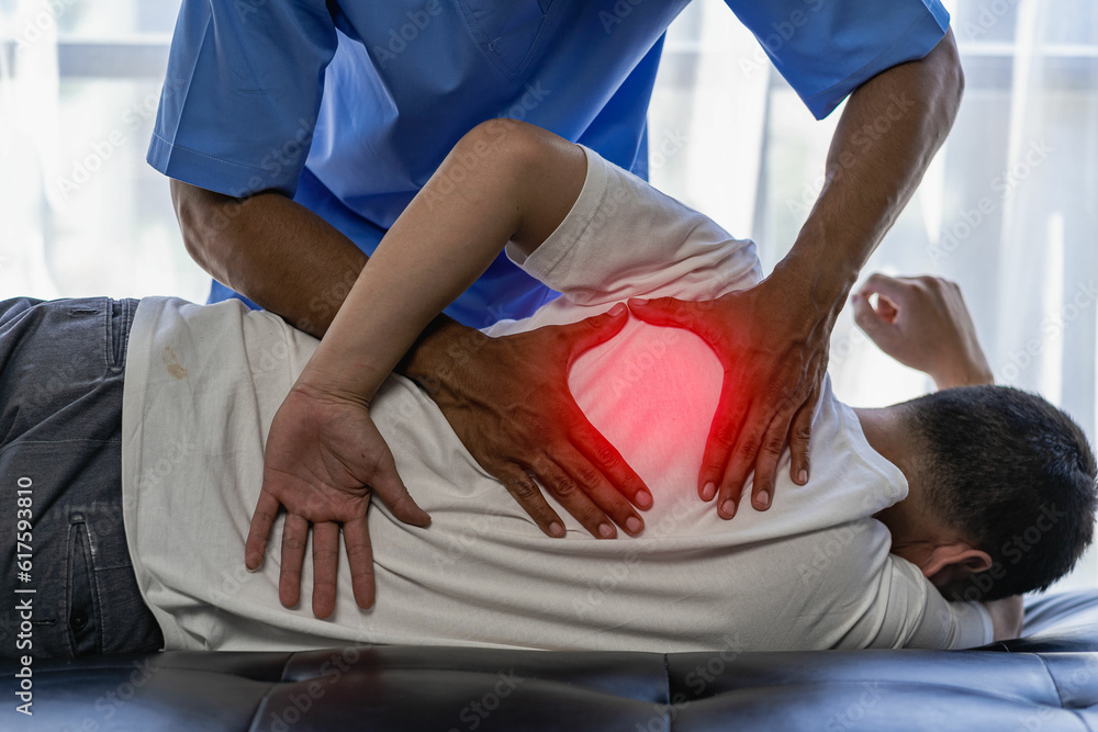 Close up patient hand doing stretching with physiotherapy to help in clinic room Therapist treats injured man with rotator cuff stretching method