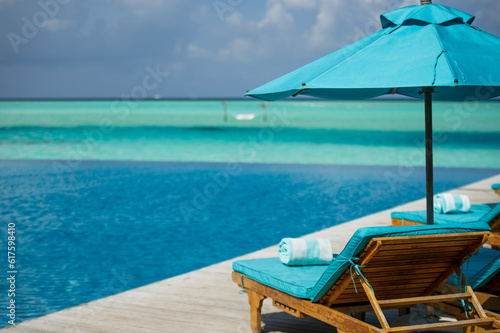 Chaise lounge in Maldivian resort with sea view