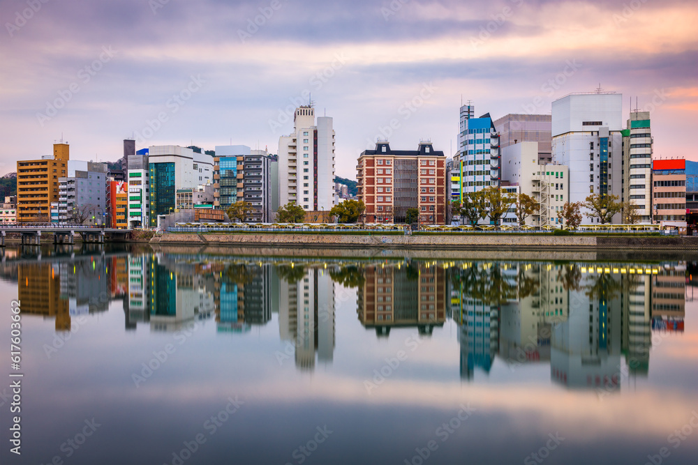 Hiroshima, Japan city skyline on the river.