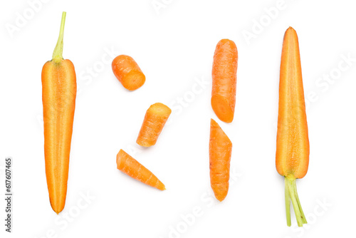 Slices of fresh carrots on white background