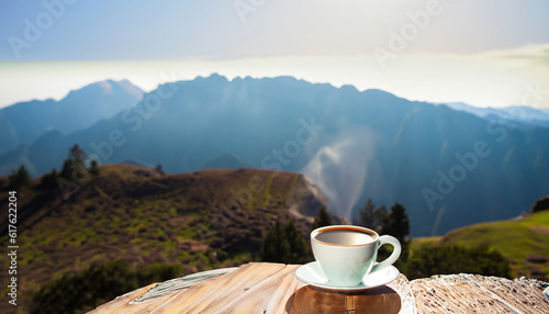 Cup of coffee near the mountain.