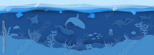 Ocean pollution with inhabitants and debris and plastic bottles.Paper cut style vector illustration.