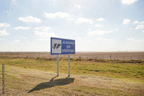 Roadside sign in Argentina: The Falklands (Malvinas) are Argentine photo