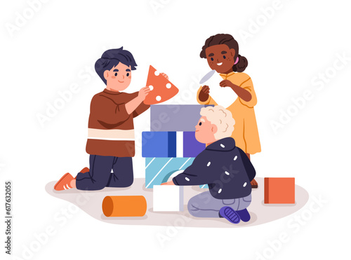 Children playing, building castle from toy blocks together. Kindergarten girl...