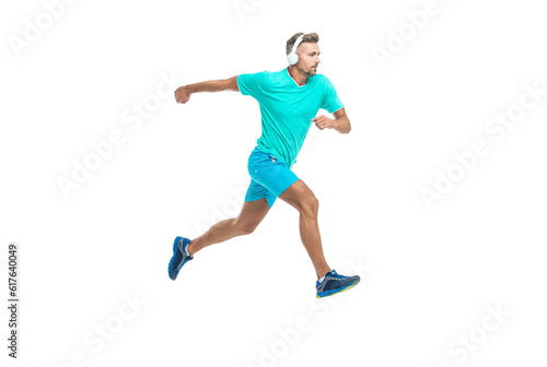 sportsman runner running isolated on white backdrop. Man sportsman running for exercise in studio. sportsman jogger running. The sportsman running at full speed towards the finish line © be free