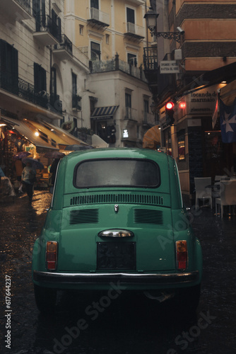 Old vintage car on the streets of Italy Amalfi coast rainy day moody