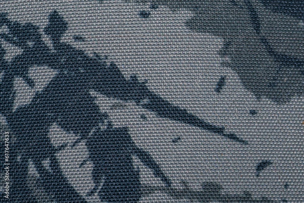 Fototapeta premium Moro wzór na odzieży wojskowej z bliska, kamuflaż 