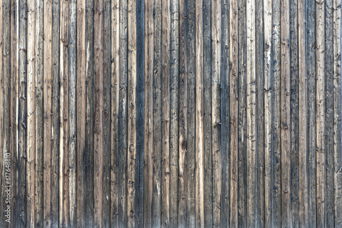 Rustic Elegance: Weathered Barn Wall as a Captivating Background Texture